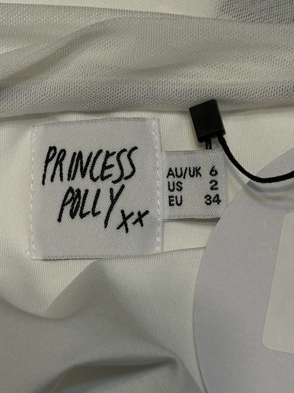 Princess Polly White Asymmetrical Lovell Ruffle Mini Skirt size 2 NWT